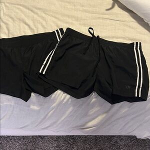 Two Black Athletic Shorts with White Stripes